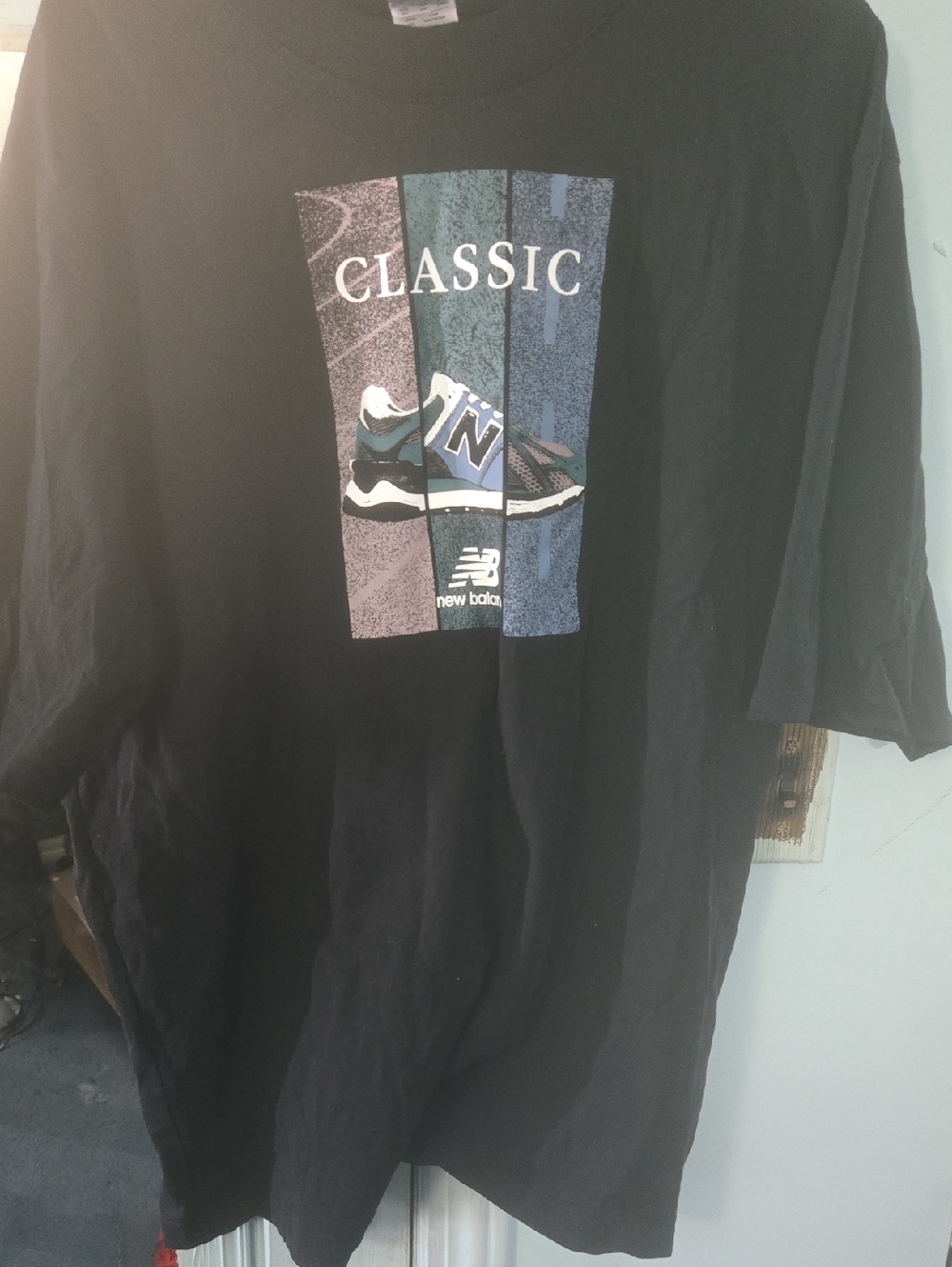 New Balance Black Classic Graphic Tee with Blue & Teal Accents